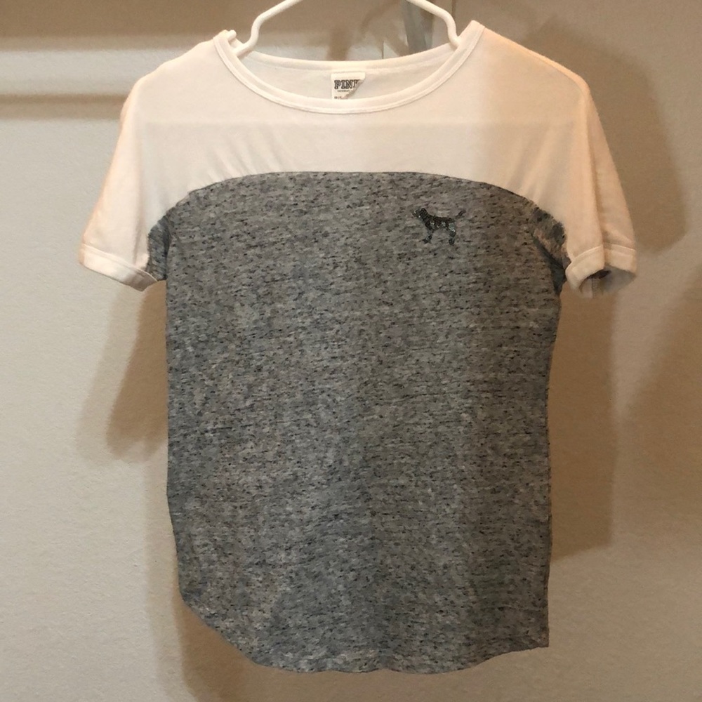a PINK t-shirt with sequins on the back